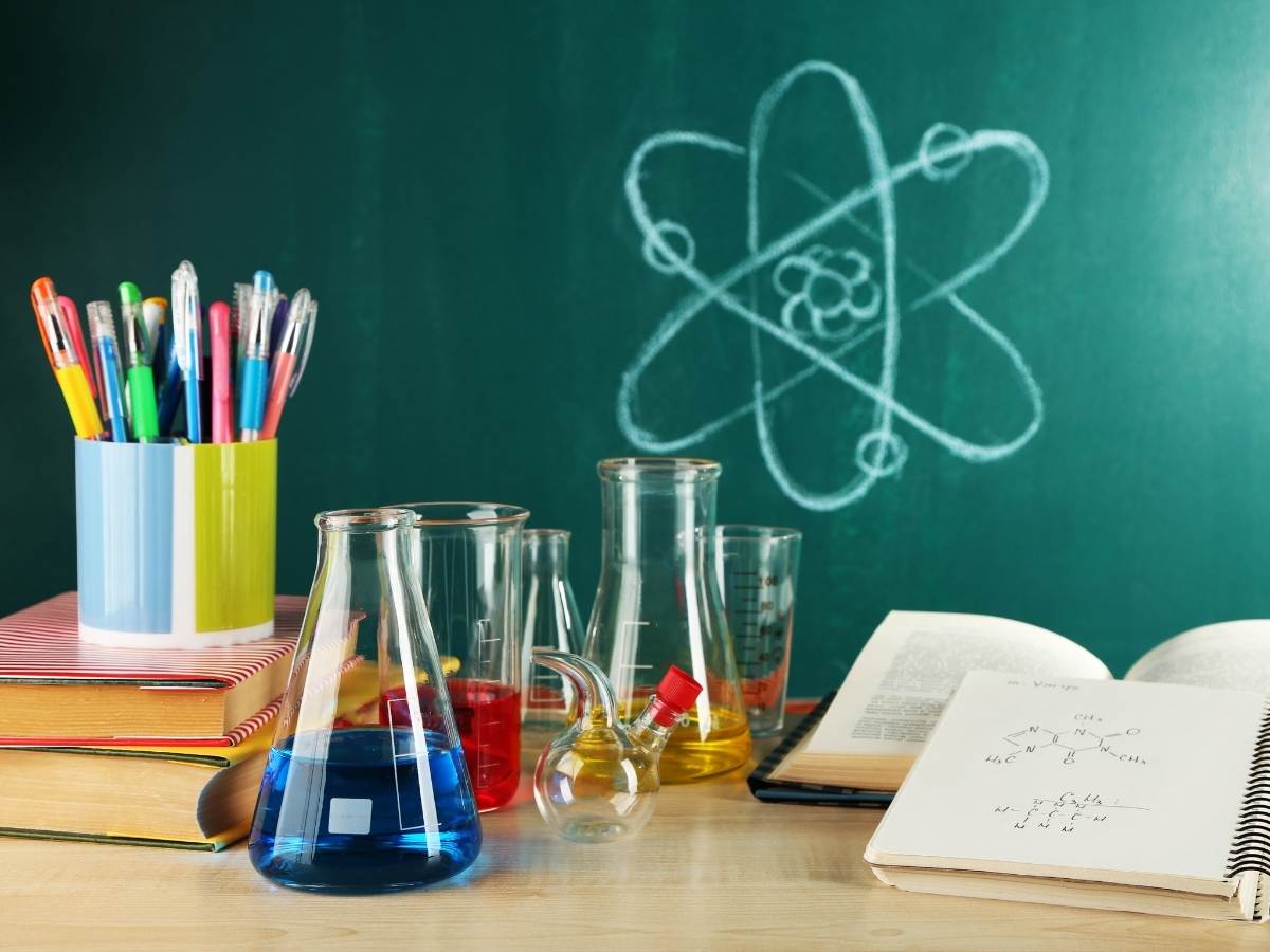 Desk in Chemistry Class with Beakers for article McMinnville School District for newcomers moving to Portland area.