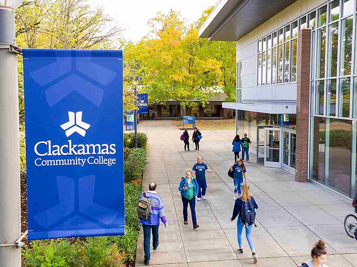 Banner with Clackamas Community College overlooking path with students walking for article Clackamas Community College for newcomers moving to Portland.