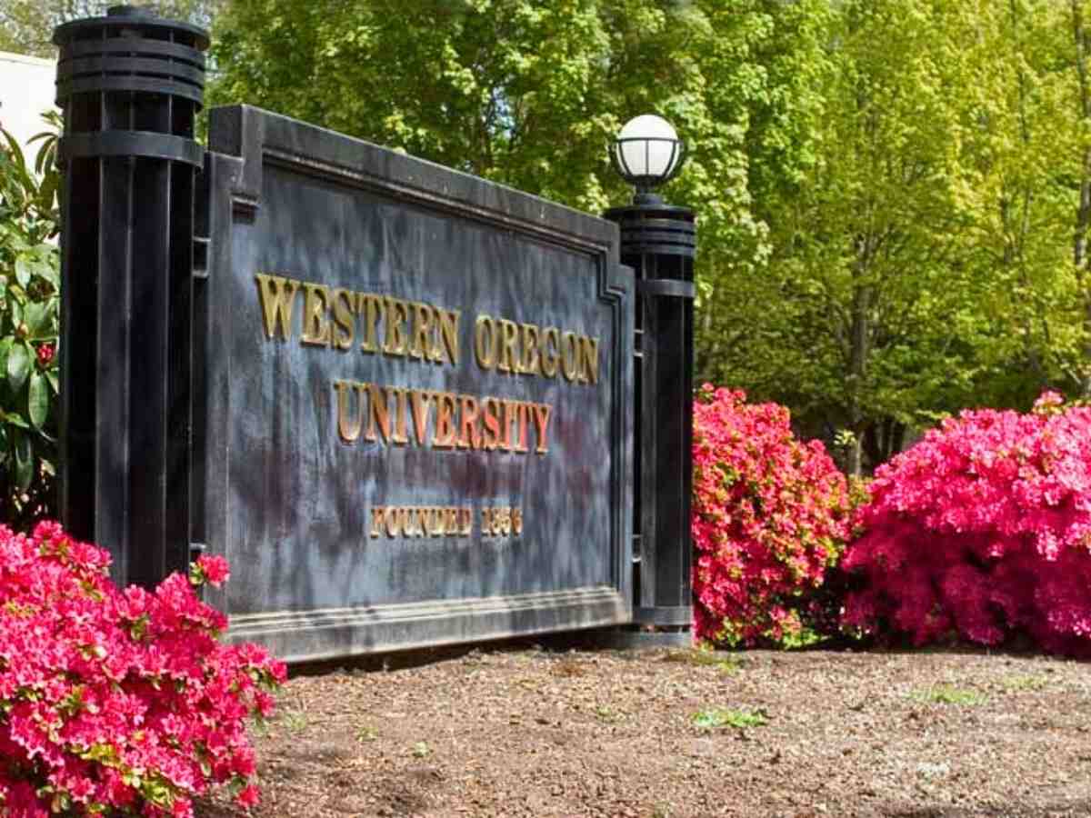 Close up picture of the campus sign for article Western Oregon University for newcomers moving to Portland.
