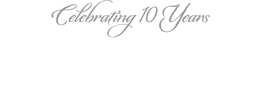 Portland White logo with the Celebrating 10 years mark