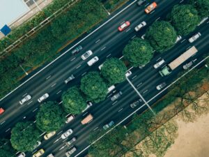 Drone view above a highway with cars.