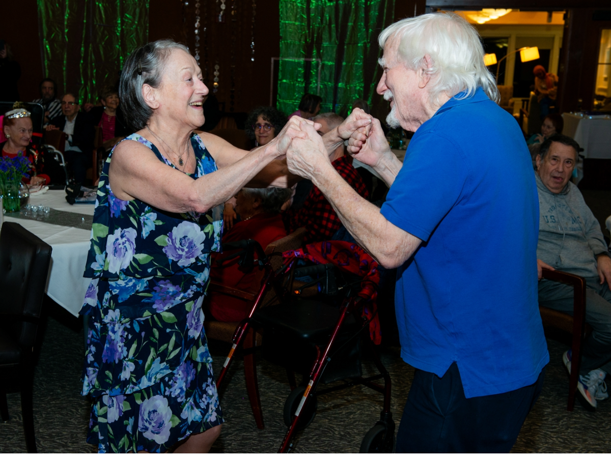 Older couple dancing at an Assisted Living facility.